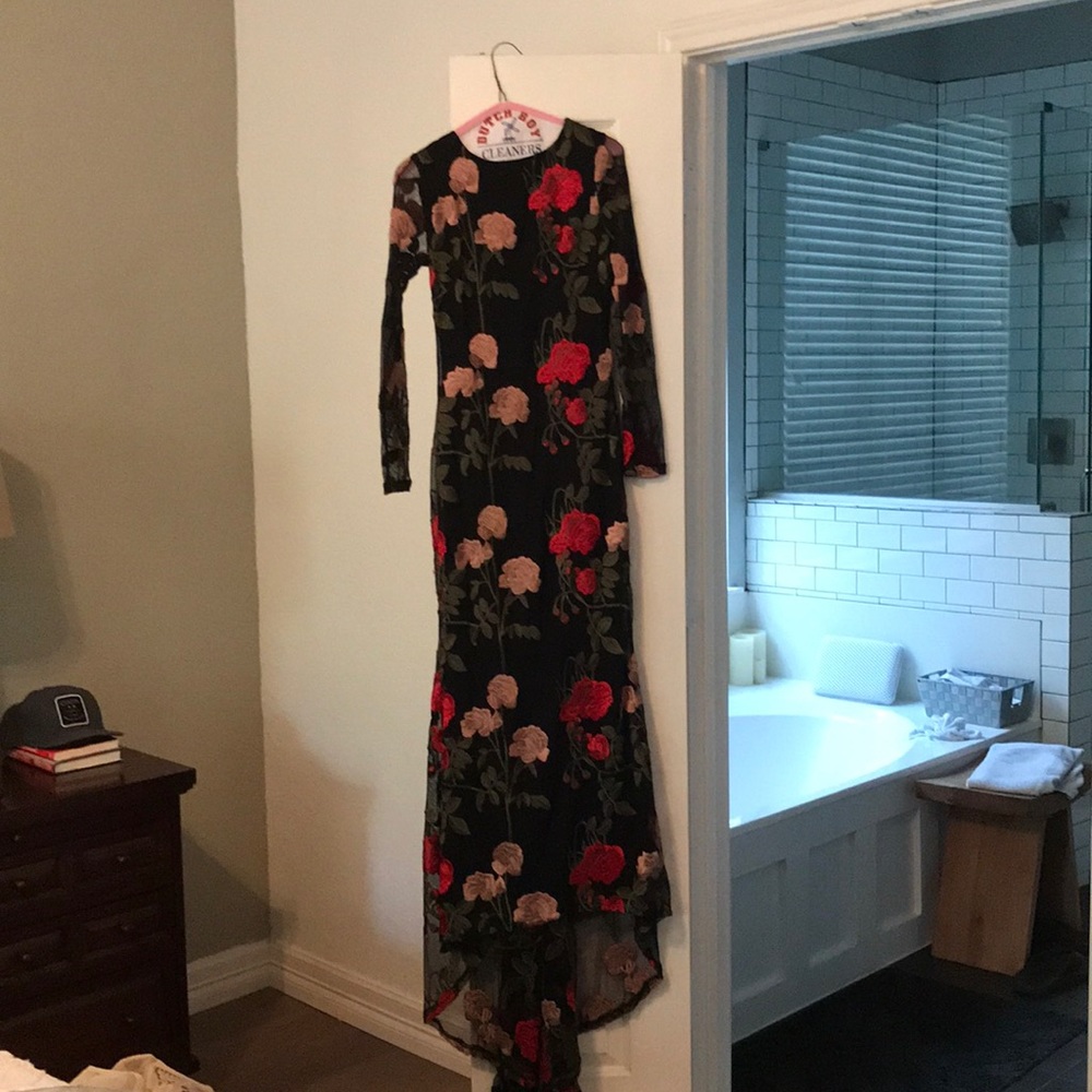 Embroidered evening  gown. With small train